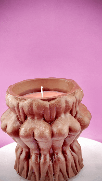 Naked women circle dark brown jar candle from Lucentius spinning 360 degrees on turntable with pink background, showing sculpted relief from all angles